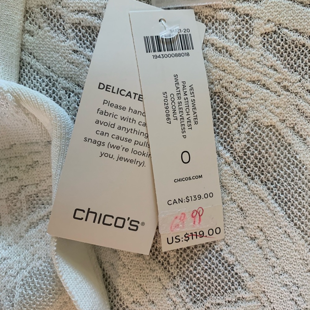 White Chico’s brand sleeveless summer cardigan. Brand new.